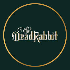 Logo of 'The Dead Rabbit' in a circular frame on a dark green background